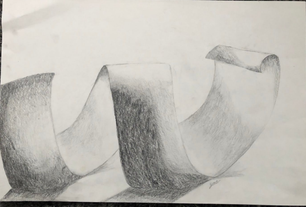 An image of a student's final drawing of a curled piece of paper