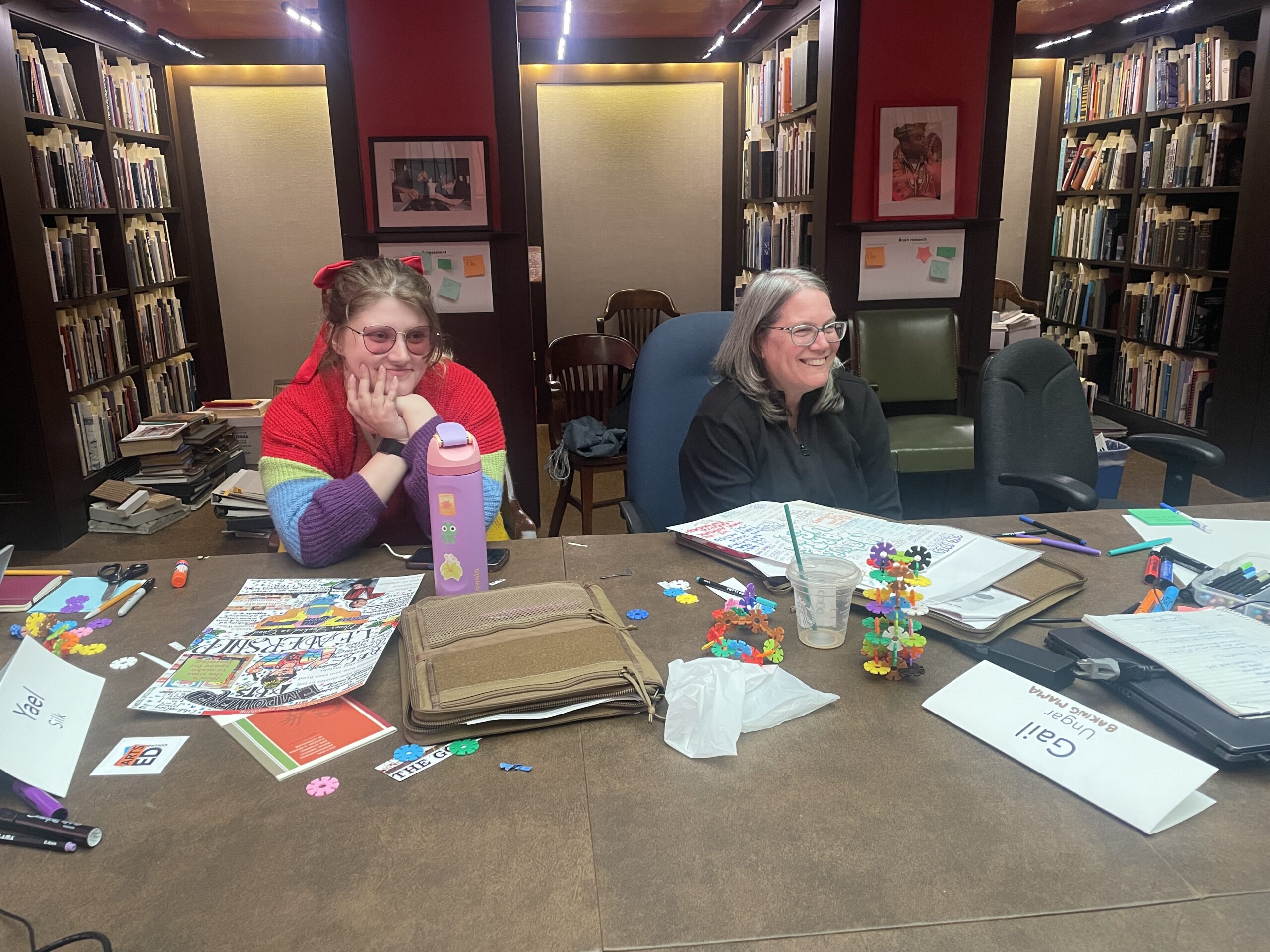 Current Leadership Academy participants sit at table during a Leadership Academy session.